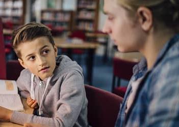 A UB student tutoring a child